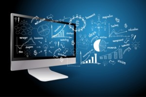 Computer With Drawing Business Plan Concept by KROMKRATHOG